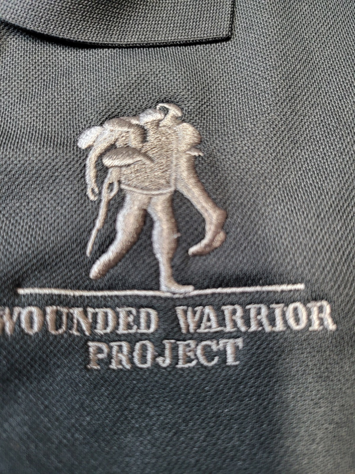 Wounded Warrior Project Polo Shirt MEDIUM Black  Sh 16" Ch 21" L 27" Under Armor