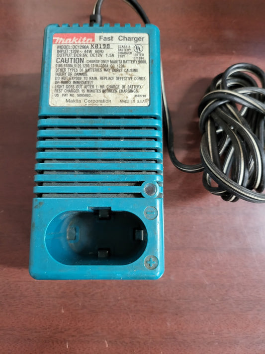 Makita Fast Charger Model DC1290A Battery Charger (battery not incl)